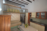 Camera con cucina