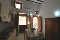 Camera con cucina